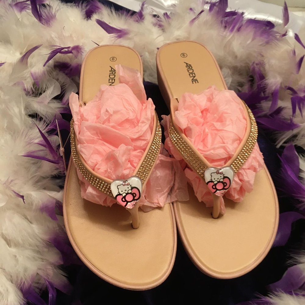 ADORABLE glass puff heart flip flops with added hello kitty details💖